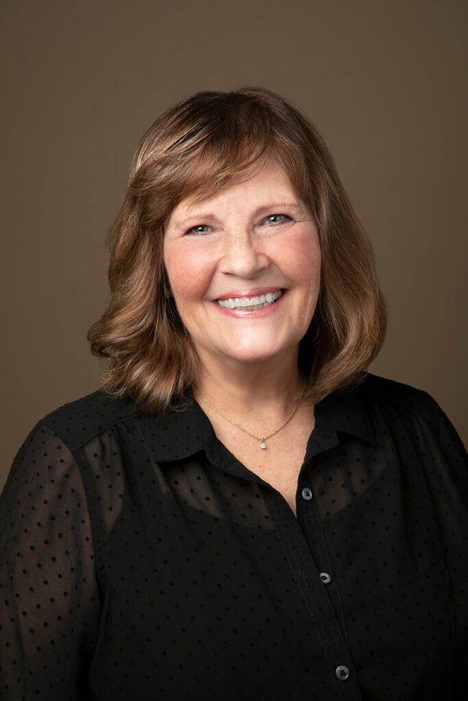 A professional headshot of Karen, the Director of Patient Care.