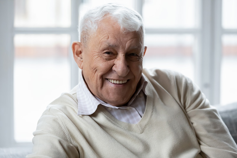 Elderly Man smiling.